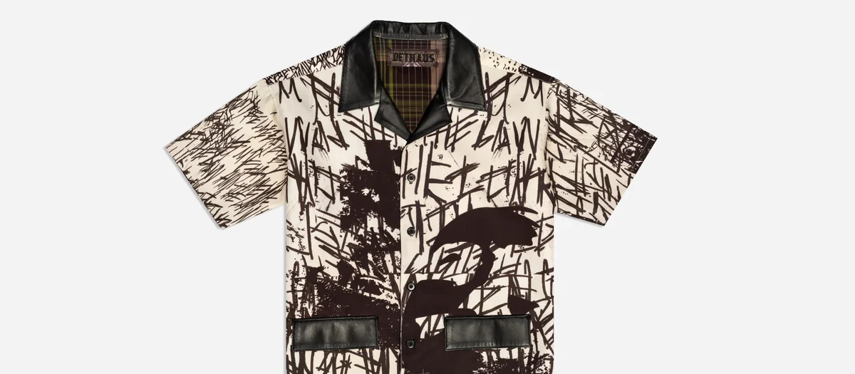 Camp shirt product flat with leather collar and flap pockets on a clean background