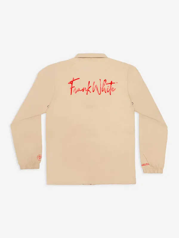 Beige coach jacket product flat, back view with red script logo, on a light gray background